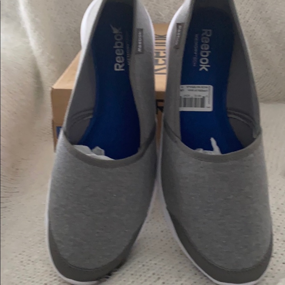Brand New never worn Reebok gray slip on